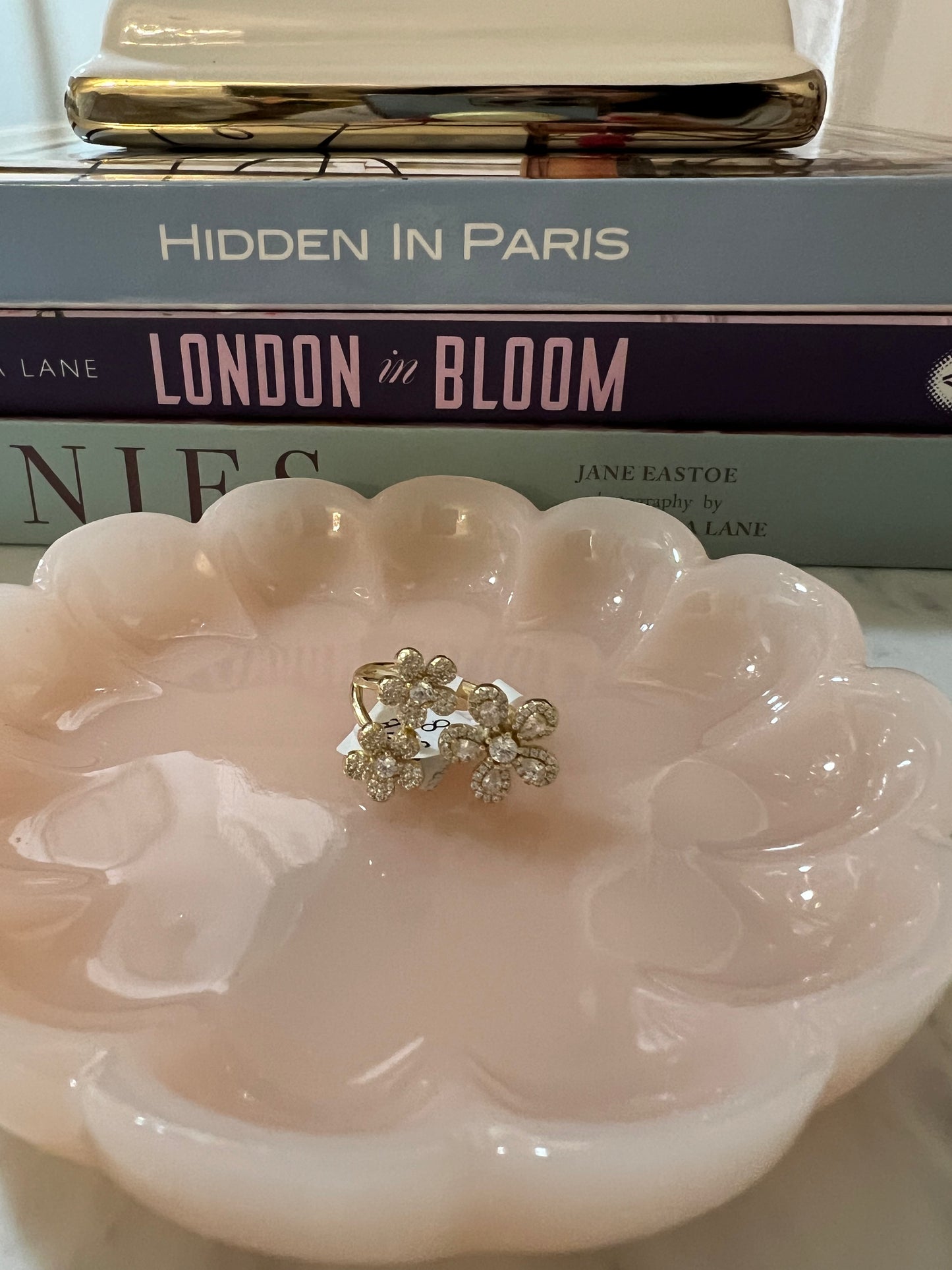 Gold adjustable flower ring with clear CZ