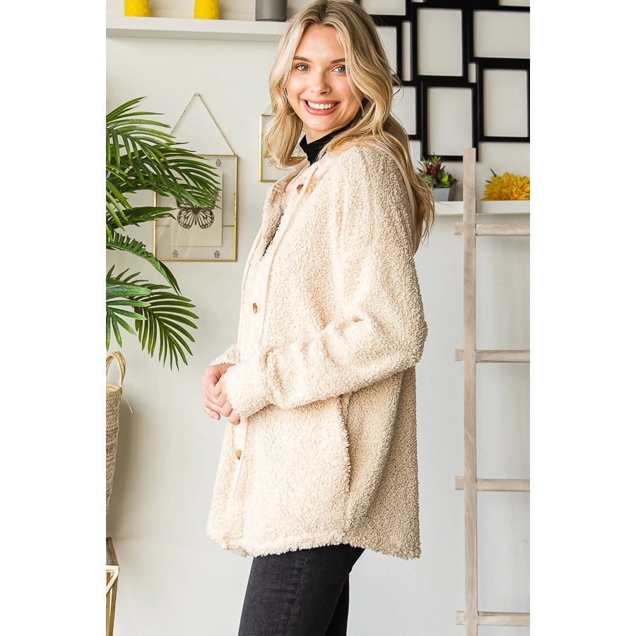 A faux fur shacket with hood in Beige or Black