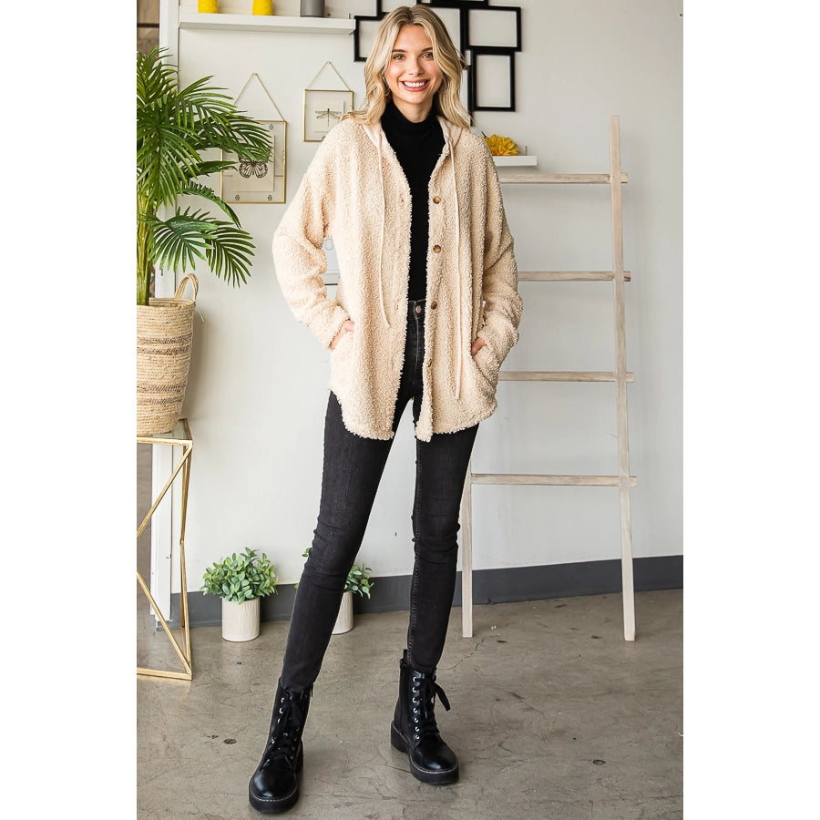 A faux fur shacket with hood in Beige or Black
