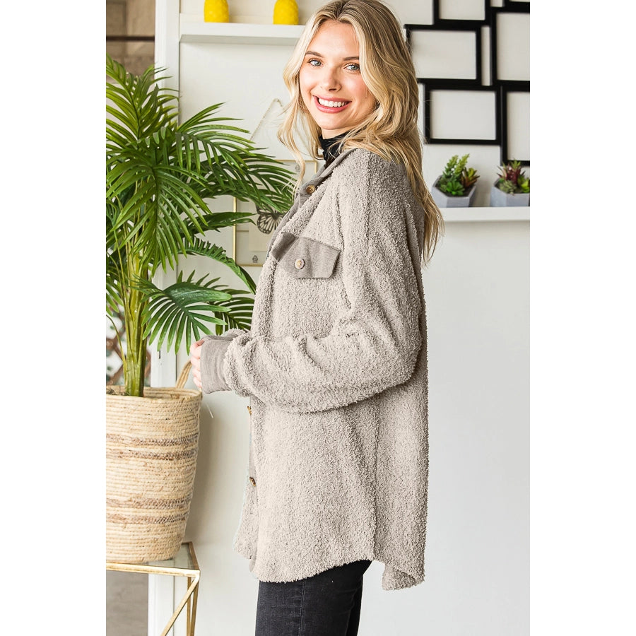 A soft solid shacket featuring a french terry contrast, collar